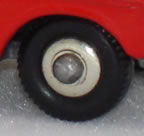 67B Volkswagen 1600TL black plastic wheels with chrome hub cap